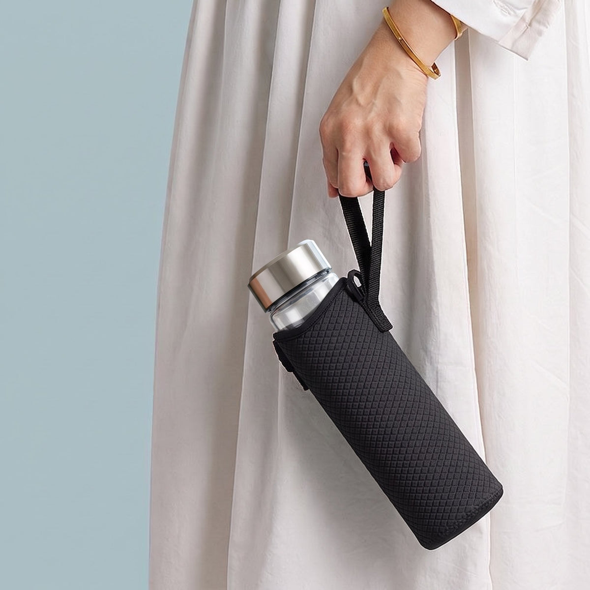 Hand holding the HydroForge Carry Sling